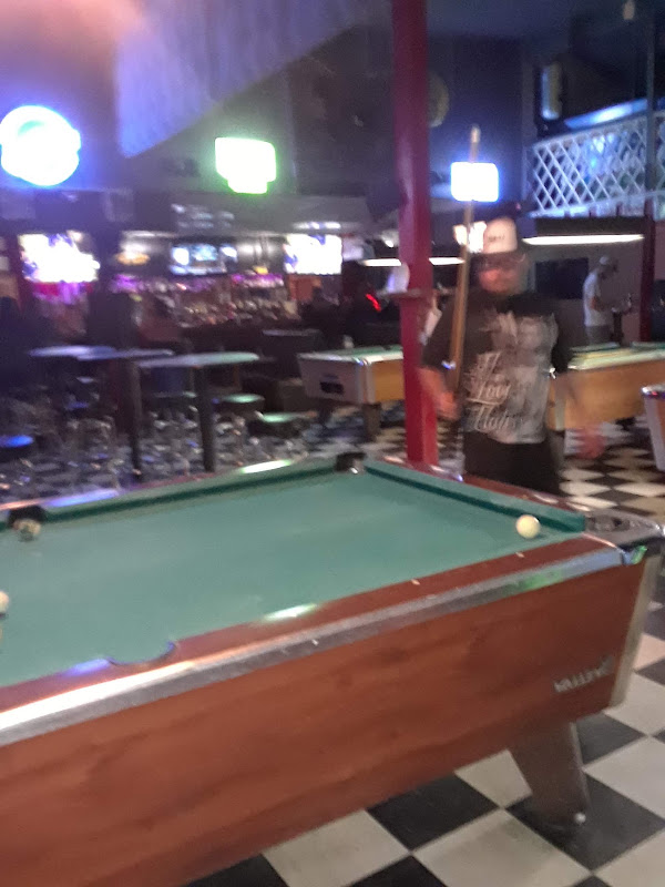 Pool tables on the checkered floor